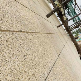 唐山 黄金麻花岗岩荔枝面外墙干挂石材效果示例