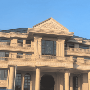 唐山黄金麻别墅外墙干挂石材效果示例