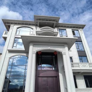 唐山白麻别墅外墙干挂石材效果示例