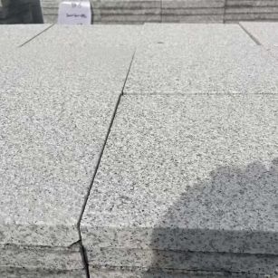 唐山 白麻花岗岩石材推荐 荔枝面地铺石