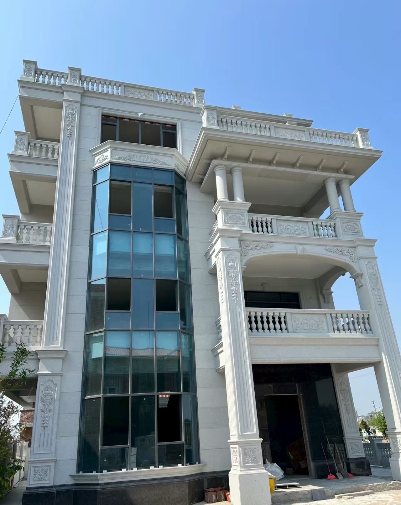 唐山 白麻花岗岩别墅外墙干挂效果展示