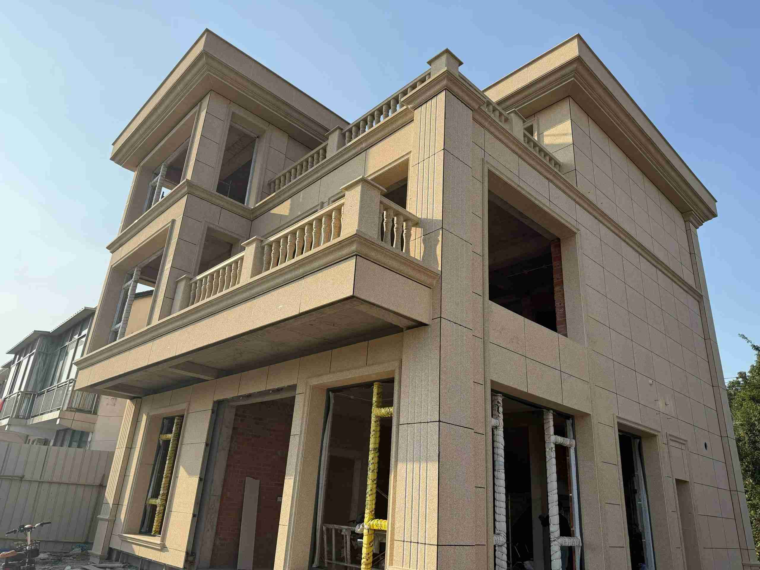 唐山 黄金麻花岗岩石材荔枝面外墙干挂效果展示